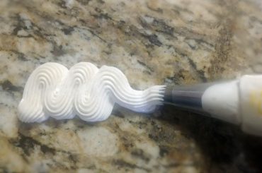 frosting swirl on a marble backdrop